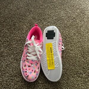 Heelys never worn or used and all accessories in the box